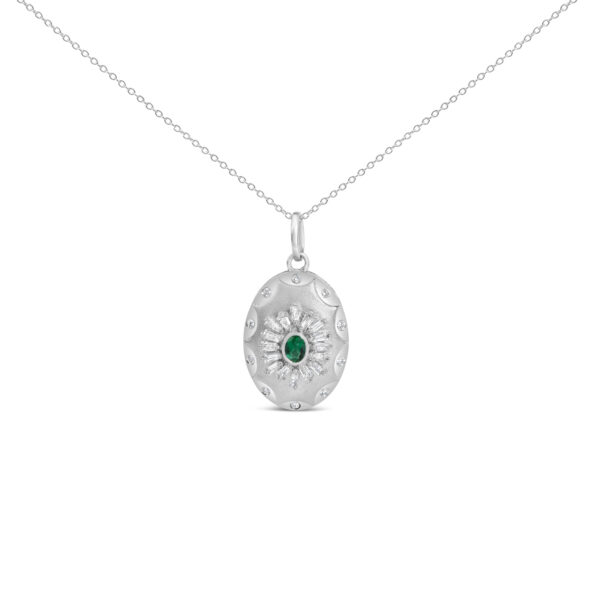 Sunburst medallion pendant with a bezel-set emerald and diamond rays, on a cable chain