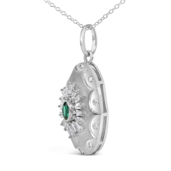 Side angle of the pendant showing the setting depth and chain attachment