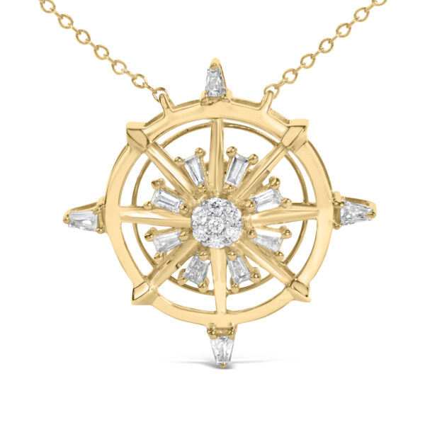 Close-up of the compass pendant showing baguette and round diamonds set in prongs