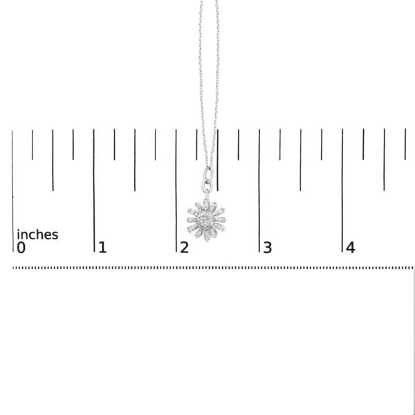 Pendant shown next to a scale reference to indicate its size