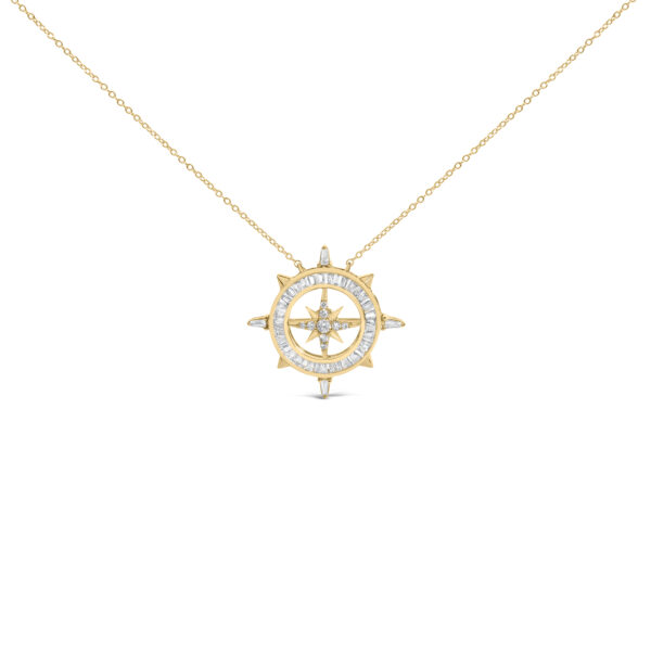 Compass-motif pendant with channel-set baguette diamonds and a round diamond accent, on a cable chain