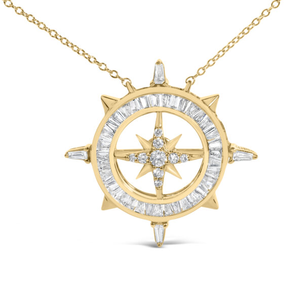 Side angle of the compass pendant showing the cable chain and spring ring clasp