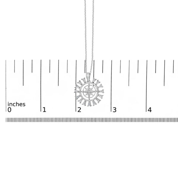Pendant shown next to a scale reference to indicate its size