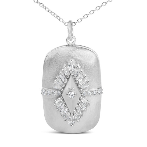 Side angle of the puffed medallion pendant showing its curved profile and chain attachment