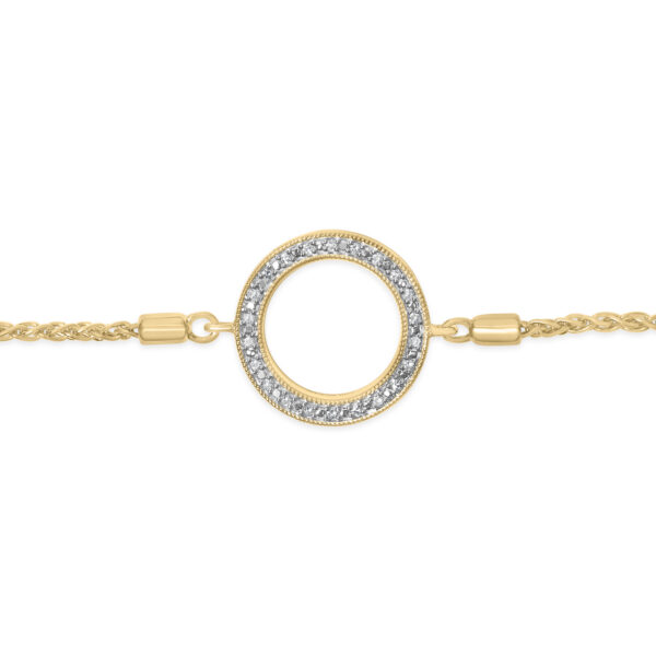 Close-up of the pave diamond circle station on the 24K gold plated bolo bracelet