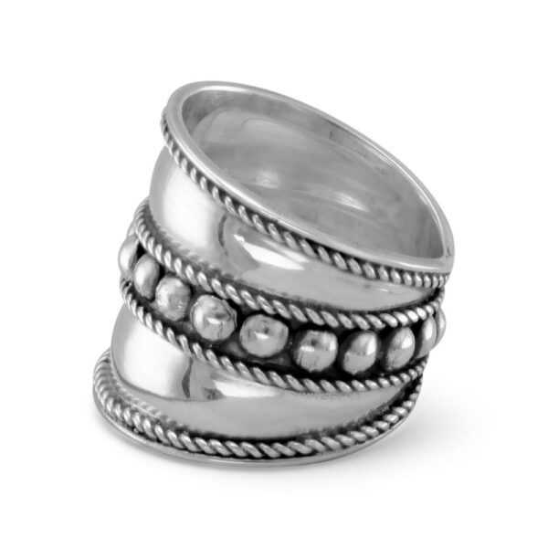 Alternate angle of the cigar-band ring showing the beaded row and rope edges along the band