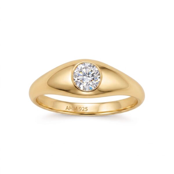 Ring with a single round bezel-set stone on a thick tapered 14K gold plated band