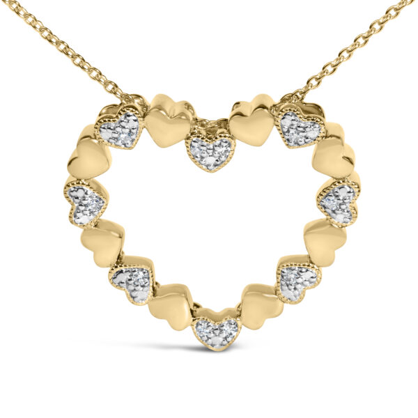 Puffed heart pendant shown from a side angle showing its rounded, domed shape