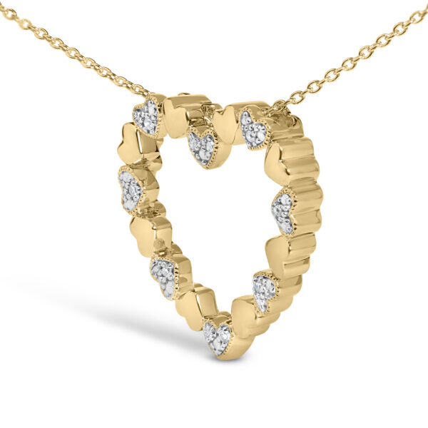 Close-up of the pave-set diamonds on the 24K gold vermeil puffed heart pendant