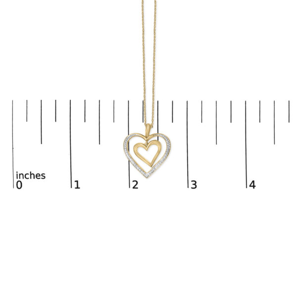 24K gold vermeil double heart pendant necklace shown next to a scale reference for size