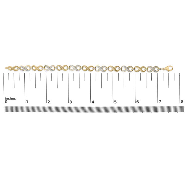 The bracelet shown next to a ruler for scale