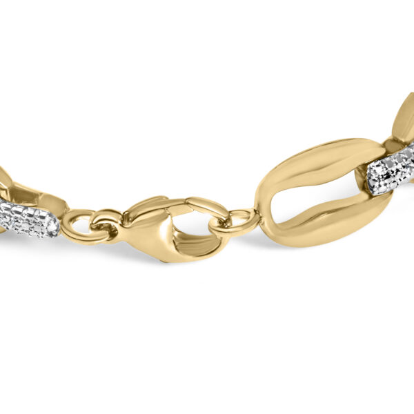 Close-up of 24K gold plated sterling silver bold links with pave diamonds between stations