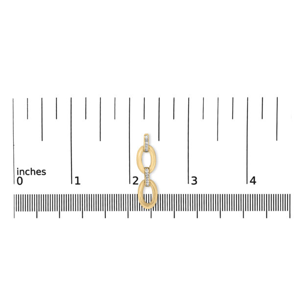 Oval link earrings shown next to a scale reference for size comparison