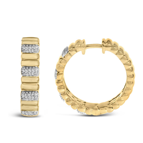 Close-up of the diamond-set section of the ribbed hoop earring highlighting individual stones
