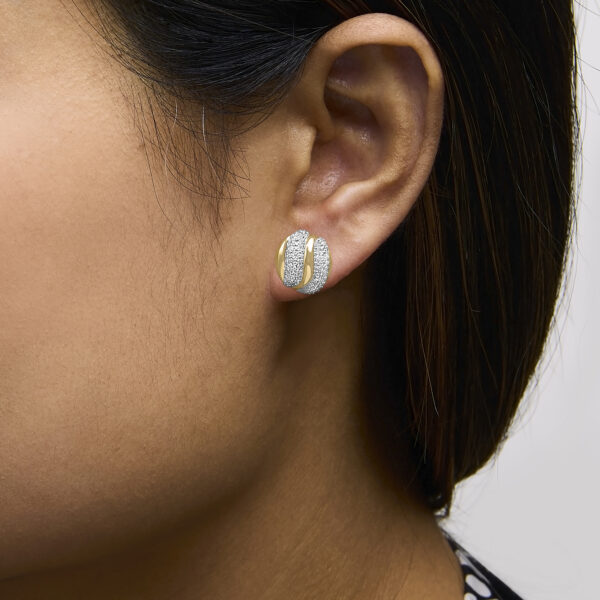 24K Gold vermeil dome stud earring worn in an ear, shown from the front