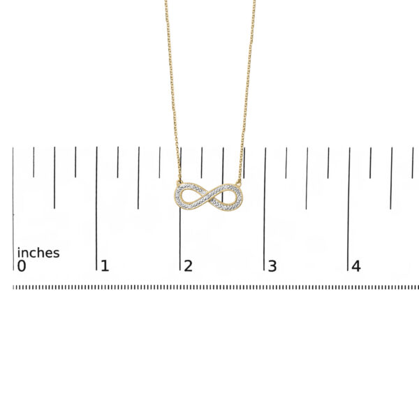 Pendant shown next to a scale reference to indicate its size