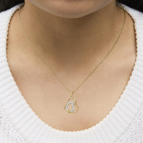 Double heart pendant necklace displayed as worn