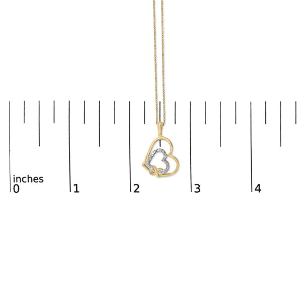Double heart pendant necklace shown at scale for size reference