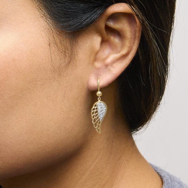 24K Gold vermeil angel wing drop earring shown worn on the ear