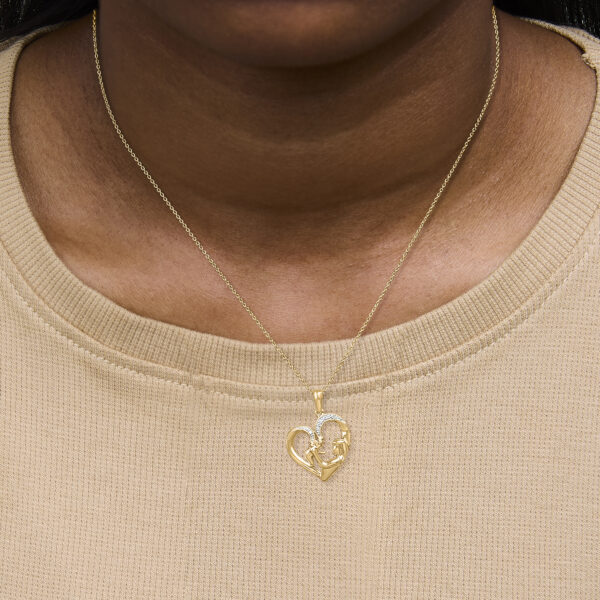 24K gold vermeil mom and child heart pendant necklace worn on a model