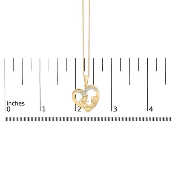 24K gold vermeil heart pendant necklace shown with a scale reference for size