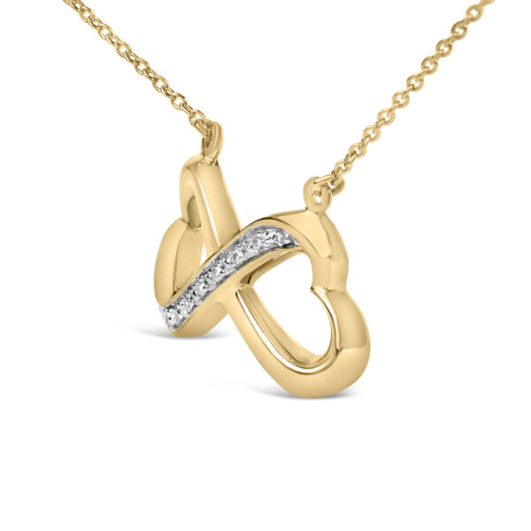 Close-up of the pave-set round diamonds on the infinity heart pendant