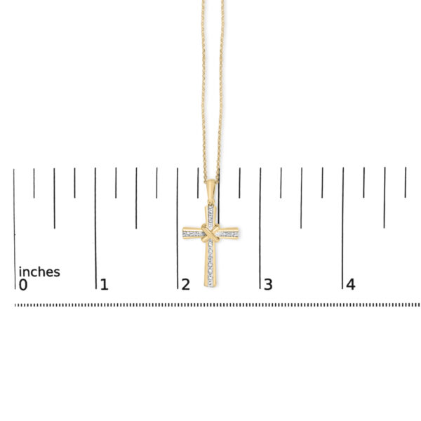 Cross pendant and chain laid flat to show overall size and proportions