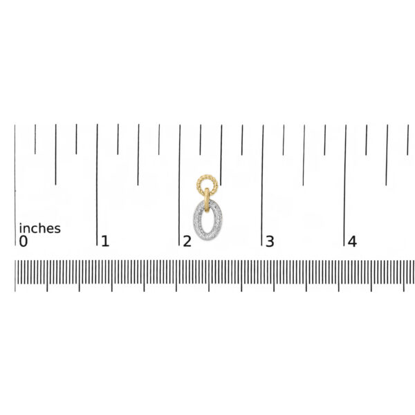 Earring shown next to a scale reference to indicate its size