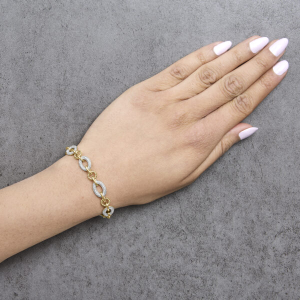 Bracelet worn on a wrist showing the oval link drape