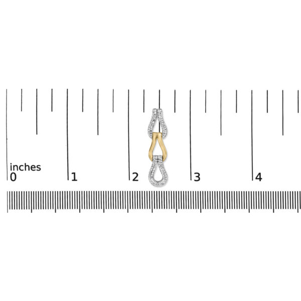 Knot link earrings shown next to a scale reference for size