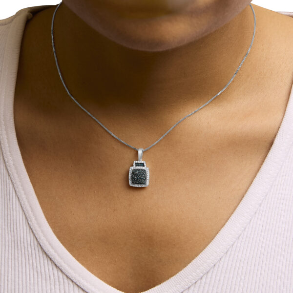 Pendant necklace displayed on a model wearing it at the collarbone