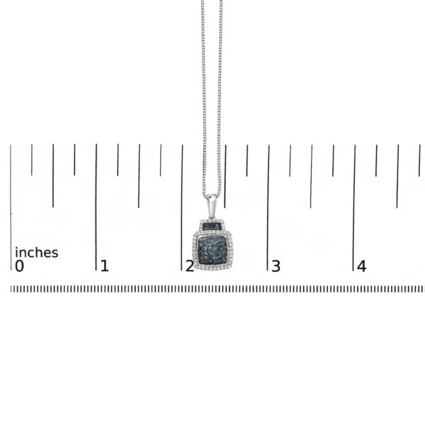 Pendant necklace shown next to a scale reference to indicate its size