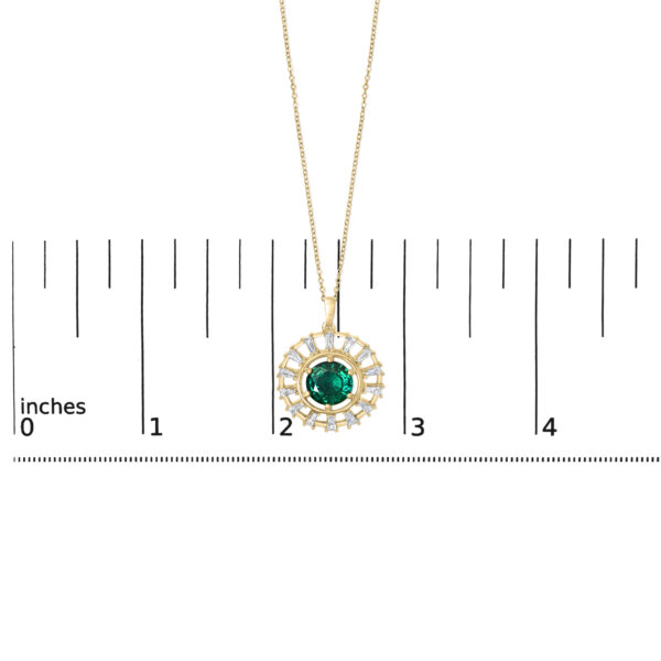 Medallion pendant shown next to a size reference to indicate its scale