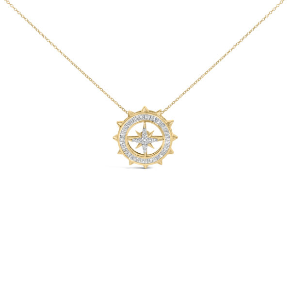 Compass medallion pendant necklace laid flat, showing the round diamond medallion and cable chain