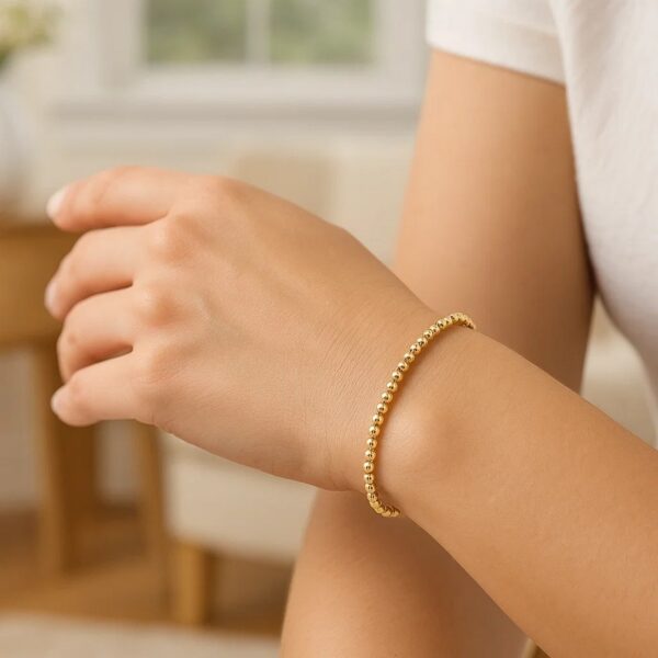 Moon Cut Bead Stretch Bracelet in 14K Yellow Gold (2.90 mm) - alternate view 3