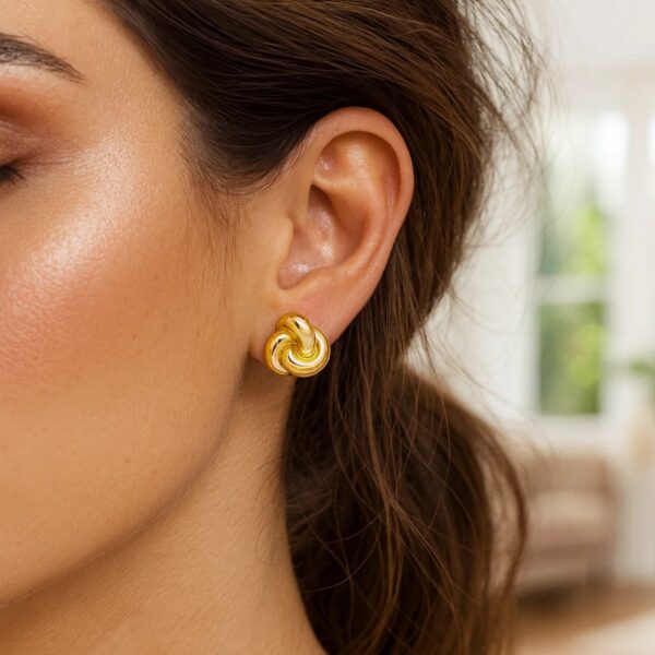 Sterling Silver Yellow Gold Plated Puffed Love Knot Stud Earrings - alternate view 3