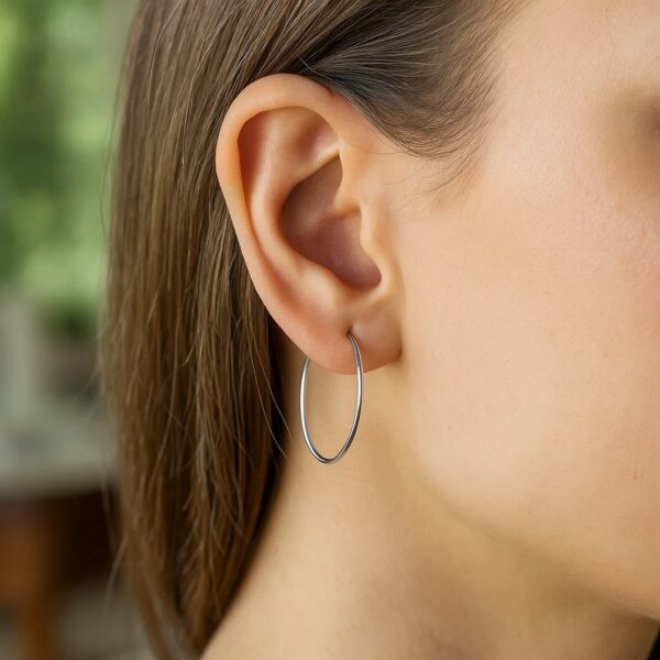 10k White Gold Polished Hoop Earrings (1.5x25 mm) - alternate view 4