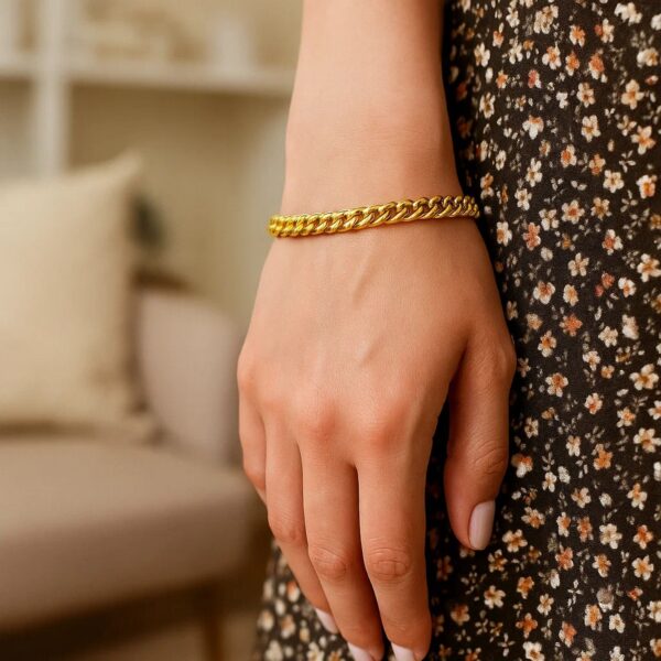 14K Yellow Gold Petite Faceted Cuban Link Chain Bracelet (4.50 mm) - alternate view 4