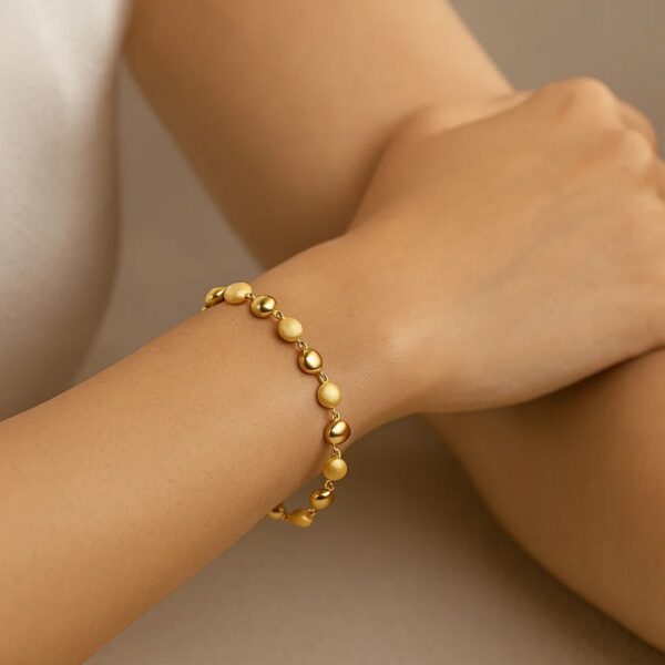14K Yellow Gold Polished and Satin Pebble Bracelet (6.00 mm) - alternate view 3