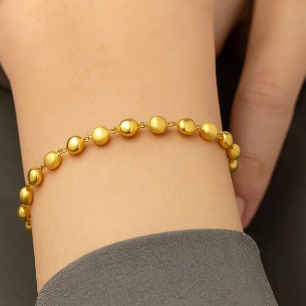 14K Yellow Gold Polished and Satin Pebble Bracelet (6.00 mm) - alternate view 4