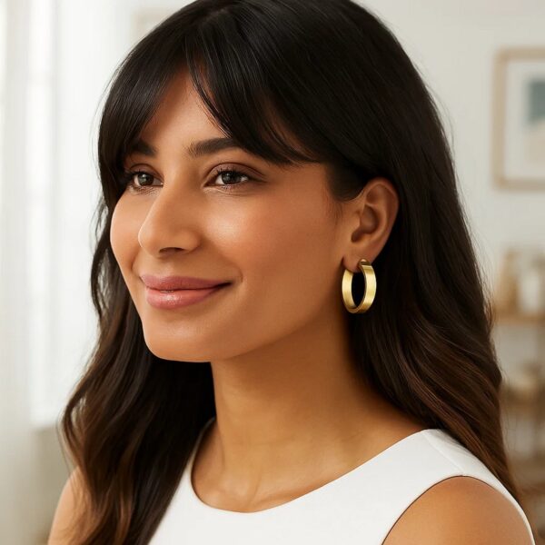 Medium Tube Shaped Hoop Earrings in 14K Yellow Gold - alternate view 3