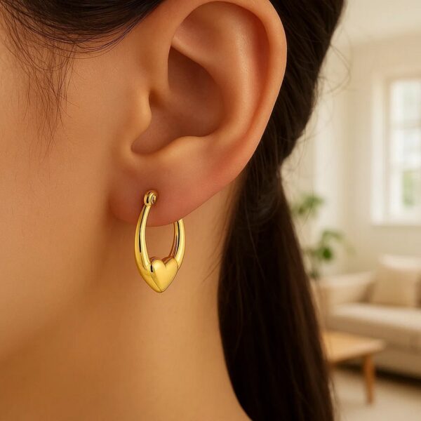 Small Heart Hoop Earrings in 14K Yellow Gold - alternate view 3