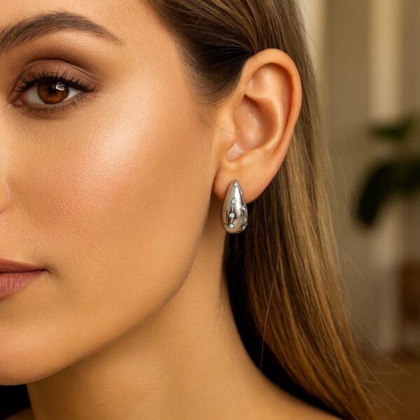 Sterling Silver Puffed Raindrop with Cubic Zirconia Stones Earrings - alternate view 3
