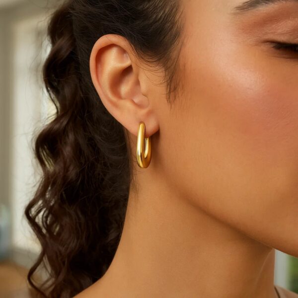 14K Yellow Gold Graduated Oval Hoop Earrings - alternate view 4